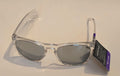 Clear sunglasses with a purple tag on a beige background